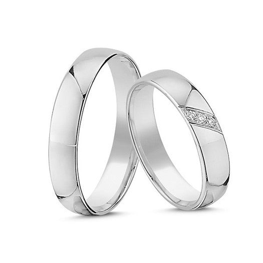 Smukke Nuran vielsesringe i 14 karat hvidguld med damering med tre diamanter i alt 0,045 ct og enkel herrering.